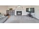 Cozy living room features a fireplace, television, and storage creating a comfortable space at 1414 75Th Nw St, Bradenton, FL 34209