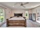 A beautifully staged main bedroom featuring soft carpet and lots of natural light at 1414 75Th Nw St, Bradenton, FL 34209