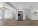 The kitchen overlooks a spacious dining area, featuring stainless steel appliances and lots of natural light at 1420 Temple St, Clearwater, FL 33756
