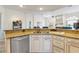 Kitchen featuring granite countertops, stainless appliances, and ample cabinetry at 14228 Teasdale Ave, Hudson, FL 34667