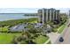 Aerial view of a condo with a large parking lot at 1501 Gulf Blvd # 201, Clearwater Beach, FL 33767