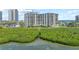 Aerial view of the condo building with water views at 1501 Gulf Blvd # 201, Clearwater Beach, FL 33767