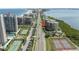 Enjoy stunning aerial view of condo, tennis courts, and beachfront location; paradise found at 1501 Gulf Blvd # 201, Clearwater Beach, FL 33767