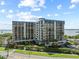 A multi-story condo building boasting numerous balconies and stunning waterfront views at 1501 Gulf Blvd # 201, Clearwater Beach, FL 33767