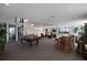Spacious game room featuring a pool table, bar, and comfortable seating area at 1501 Gulf Blvd # 201, Clearwater Beach, FL 33767