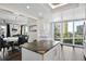 Bright kitchen with open-concept design, connecting to the dining and living areas with views of the city at 1501 Gulf Blvd # 201, Clearwater Beach, FL 33767