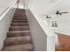 Staircase leading to the upper level of the home at 17342 Lawn Orchid Loop, Land O Lakes, FL 34638