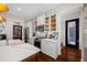 Bright kitchen with stainless appliances, and a pantry door at 18202 Abbey Ln, Lutz, FL 33548