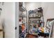 Walk-in pantry with adjustable wire shelving, providing ample storage space at 18202 Abbey Ln, Lutz, FL 33548