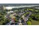Aerial view of homes, streets, and a serene lake in a residential neighborhood at 2043 Wrangler Dr, Brandon, FL 33511