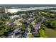 Community aerial view features lakes, mature trees, and many single Gathering homes at 2043 Wrangler Dr, Brandon, FL 33511