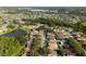 Community aerial showcases homes nestled around lakes, offering a scenic and tranquil environment at 2043 Wrangler Dr, Brandon, FL 33511