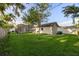 Expansive backyard with a pool and detached garage at 2043 Wrangler Dr, Brandon, FL 33511