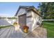 Detached one car garage with a brick path in a beautiful backyard at 2043 Wrangler Dr, Brandon, FL 33511