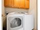Laundry room with a large white washer and dryer at 2043 Wrangler Dr, Brandon, FL 33511