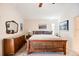 Calm main bedroom with ceiling fan, soft lighting, and neutral décor at 2043 Wrangler Dr, Brandon, FL 33511