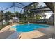 Relaxing screened-in pool area with ample space for lounge chairs and outdoor entertaining at 2043 Wrangler Dr, Brandon, FL 33511