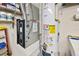 Utility room featuring water heater, HVAC, and shelving at 2043 Wrangler Dr, Brandon, FL 33511
