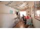 Cozy bedroom features vine decor, creating an inviting atmosphere at 214 W Hanna Ave # A, Tampa, FL 33604