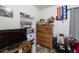 Bedroom featuring a dresser, window with covering and clothing at 214 W Hanna Ave # A, Tampa, FL 33604
