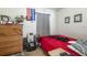 Bedroom featuring a dresser, window, and clothing at 214 W Hanna Ave # A, Tampa, FL 33604