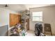 Indoor room shot with a shelf, boxes, and a window at 214 W Hanna Ave # A, Tampa, FL 33604