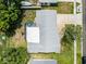 This aerial view showcases the roof, backyard, and patio at 2481 12Th Sw Ave, Largo, FL 33770
