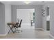 Open-concept living space flows seamlessly into the dining area with light-filled interior and stylish decor at 2481 12Th Sw Ave, Largo, FL 33770