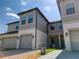 Charming townhome with a private garage, a welcoming entryway, and neat, attractive curb appeal at 2487 Golden Pasture Cir, Clearwater, FL 33764