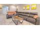 Spacious living room featuring stylish furniture, area rug, and modern decor at 2487 Golden Pasture Cir, Clearwater, FL 33764