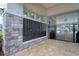 Community mailboxes with stone accent wall and view to pool area at 2487 Golden Pasture Cir, Clearwater, FL 33764
