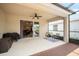 Covered patio featuring ceiling fan and an outdoor seating area at 2513 Knight Island Dr, Brandon, FL 33511