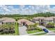 Beautiful single Gathering home located near a serene pond with a view of green trees at 3197 Acacia Bay Ave, Wesley Chapel, FL 33543