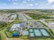 Aerial view of neighborhood amenities and recreational facilities at 3197 Acacia Bay Ave, Wesley Chapel, FL 33543