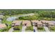 A beautiful single Gathering home with a view of a lake, trees, and serene community at 3197 Acacia Bay Ave, Wesley Chapel, FL 33543