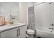 Bathroom featuring modern vanity, and shower/tub with contemporary fixtures at 3197 Acacia Bay Ave, Wesley Chapel, FL 33543