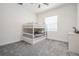 Bedroom with carpet, bright natural light, and a bunk bed at 3197 Acacia Bay Ave, Wesley Chapel, FL 33543