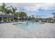 Fun splash pad with colorful water features, lounge chairs, and covered seating for Gathering enjoyment at 3197 Acacia Bay Ave, Wesley Chapel, FL 33543
