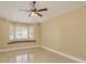 Bedroom featuring a bay window and neutral color palette at 3337 Crescent Oaks Blvd, Tarpon Springs, FL 34688