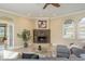 Bright living room with fireplace at 3337 Crescent Oaks Blvd, Tarpon Springs, FL 34688