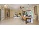 Open concept living room that looks out to the pool at 3337 Crescent Oaks Blvd, Tarpon Springs, FL 34688