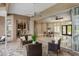 Outdoor patio with sliding glass doors leading to kitchen and dining areas at 3337 Crescent Oaks Blvd, Tarpon Springs, FL 34688