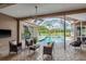 Open-air pool area with seating and an amazing view of the outdoors at 3337 Crescent Oaks Blvd, Tarpon Springs, FL 34688