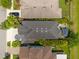Aerial view of home with landscaping, paver patio, gazebo, and backyard at 3532 Wicket Field Rd, Lutz, FL 33548
