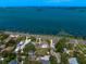 Picturesque aerial view capturing the property's location along the waterfront with stunning water views at 43 Edgewater Dr, Dunedin, FL 34698