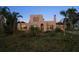 Lovely home showcasing unique architecture with ample space and great potential at 43 Edgewater Dr, Dunedin, FL 34698