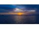 Tranquil waterfront view featuring a beautiful sunset over the calm waters at 43 Edgewater Dr, Dunedin, FL 34698