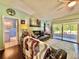 Inviting living room with a comfortable sofa, sliding glass doors to the patio, and a bright, airy feel at 4901 Taylor N St, St Petersburg, FL 33714