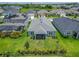 A birds eye view showcases the beautiful backyard and neighboring homes and views of nearby community at 5415 Limelight Dr, Apollo Beach, FL 33572