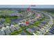 Stunning aerial view of a residential area with community pool and scenic ponds surrounding the beautiful homes at 5415 Limelight Dr, Apollo Beach, FL 33572